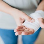 woman-with-gauze-bandage-wrapped-around-her-hand.jpg